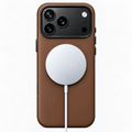 Tanner brown leather iPhone case with a MagSafe charger attached
